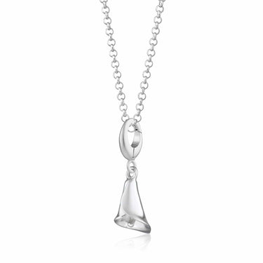 A silver necklace with a 3D lily flower charm attached to a clip-on clasp, suspended from a belcher chain.