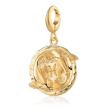 A gold-plated Pisces zodiac charm featuring a design with two koi fish and the astrological symbol, attached to a clip on clasp.