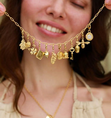 Spring and Summer Themed Charms on Gold Charm Bracelet