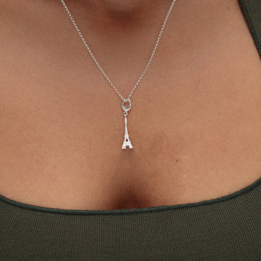 Woman Wearing Silver Eiffel Tower Charm Necklace | Paris Pendant Necklace