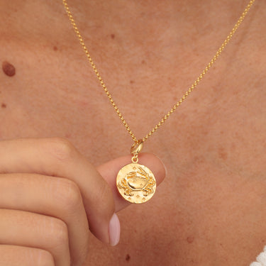 Gold Cancer Charm necklace with raised crab motif