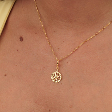 Woman Wearing Gold Compass Charm Necklace | Nautical Pendant Necklace