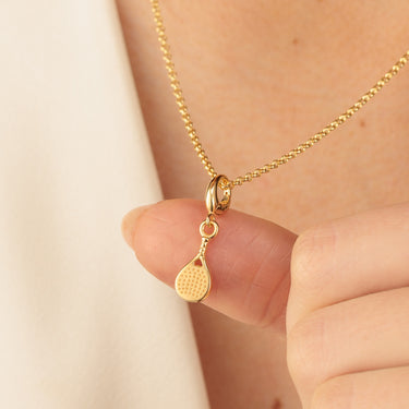 Close Up of our gold padel racket charm necklace 
