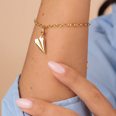 Gold Paper Plane Charm on gold Charm Bracelet by Lily Charmed