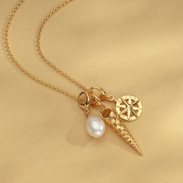 Gold Spire Shell Charm on Charm Necklace with Pearl & Compass Charm