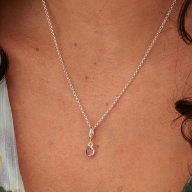 Woman Wearing October Birthstone Charm Necklace | Pink Tourmaline Pendant