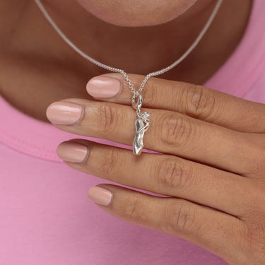 Woman Holding Silver Pointe Ballet Shoe Necklace | Ballet Slipper Pendant