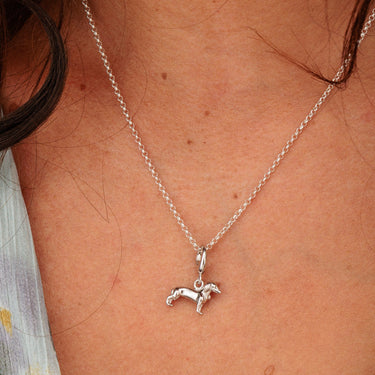 Woman Wearing Silver Sausage Dog Charm Necklace | Animal Pendant Necklace