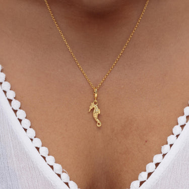 Woman Wearing Gold Seahorse Charm Necklace | Ocean-Inspired Pendant