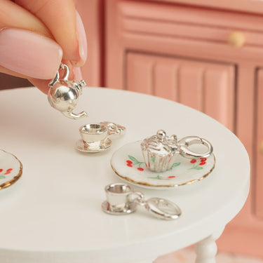 Silver Teacup Charms on Miniature Kitchen Table