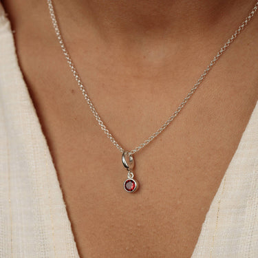 Woman Wearing Garnet January Birthstone Charm Necklace | Gemstone Pendant