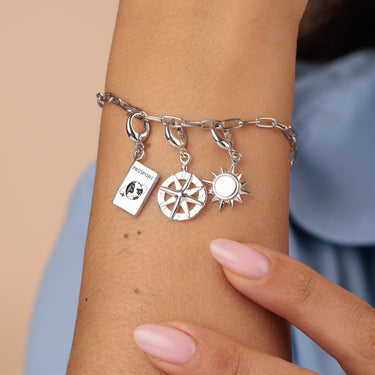 Silver Passport Charm on Charm Bracelet