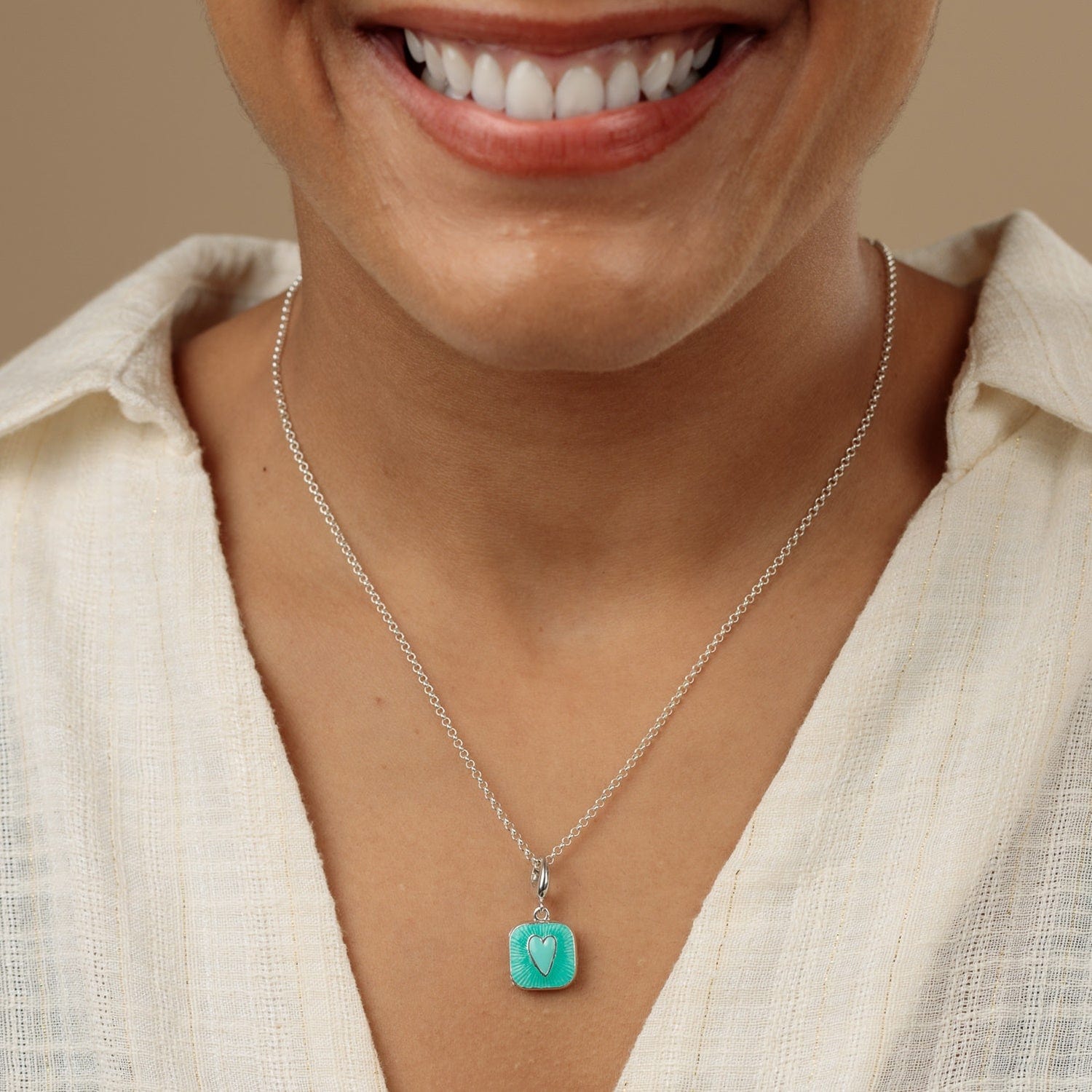 Symbol of Hope Sun Necklace in Silver and Turquoise Symbol of Hope Sun Necklace in Silver and Turquoise