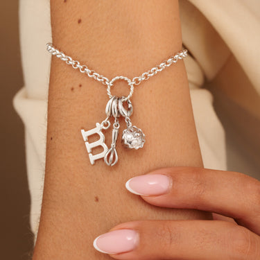 Silver Eternity Twist Charm Bracelet with Silver Hobby & Letter Charms