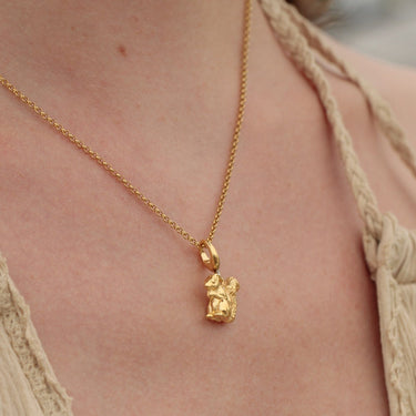Woman Wearing Gold Squirrel Charm Necklace | Animal Pendant 