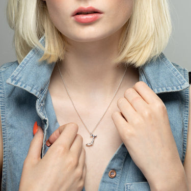 Woman Wearing Silver Whale Charm Necklace | Whale Pendant